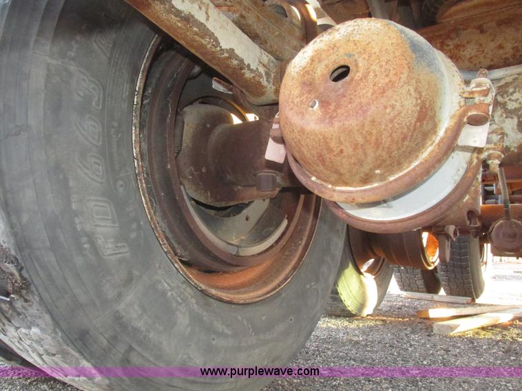 image for item G9811 1990 Cornhusker aluminum triple axle pup dump trailer