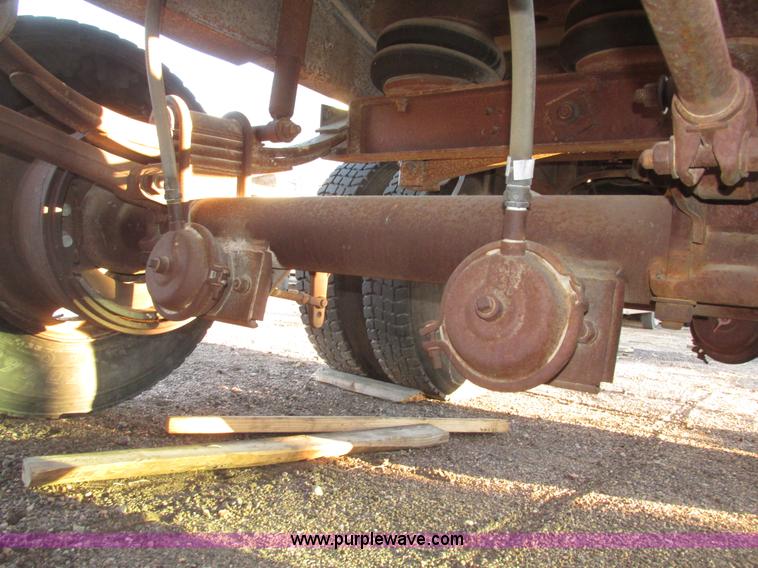 image for item G9811 1990 Cornhusker aluminum triple axle pup dump trailer