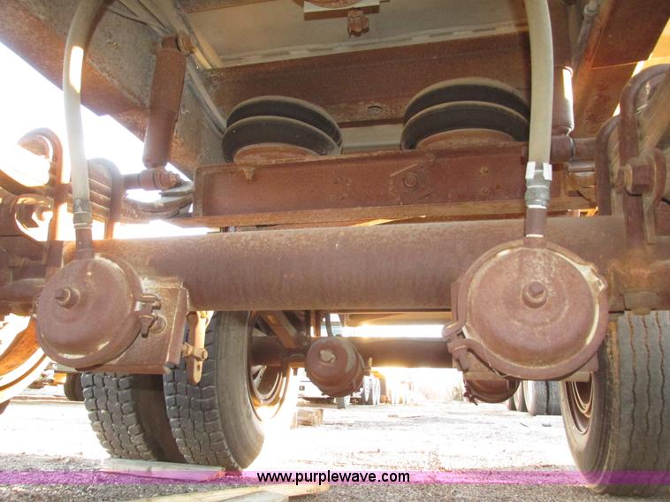 image for item G9811 1990 Cornhusker aluminum triple axle pup dump trailer