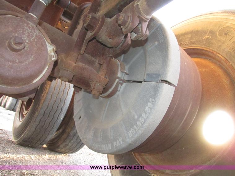 image for item G9811 1990 Cornhusker aluminum triple axle pup dump trailer