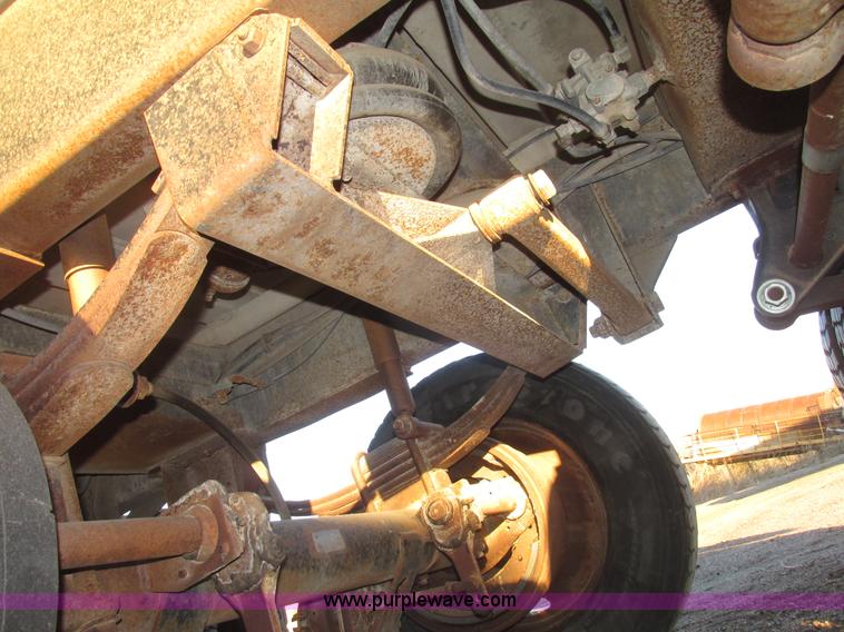 image for item G9811 1990 Cornhusker aluminum triple axle pup dump trailer