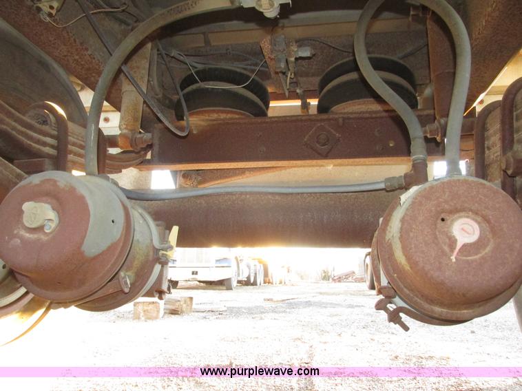 image for item G9811 1990 Cornhusker aluminum triple axle pup dump trailer