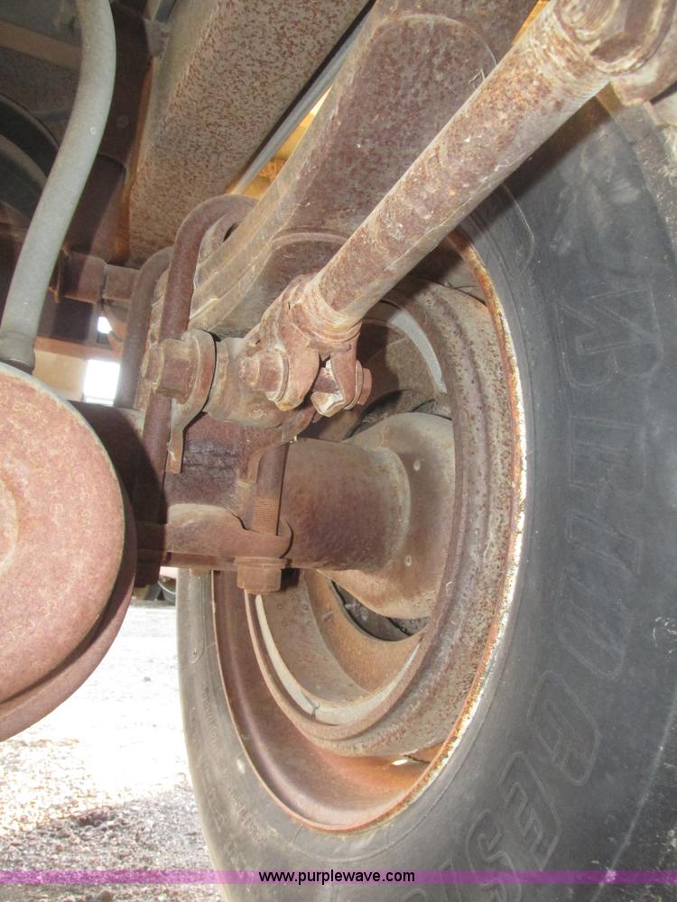 image for item G9811 1990 Cornhusker aluminum triple axle pup dump trailer