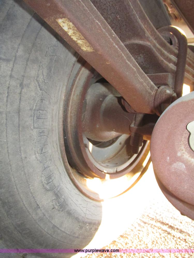 image for item G9811 1990 Cornhusker aluminum triple axle pup dump trailer