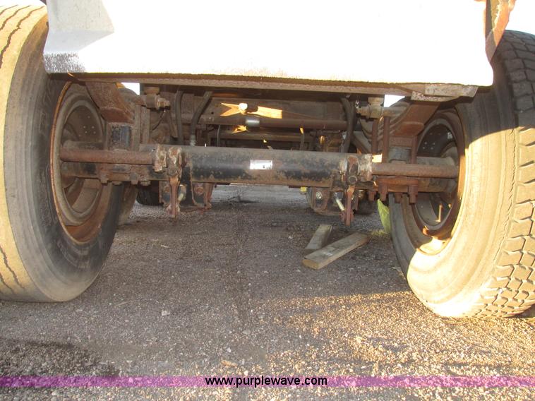 image for item G9811 1990 Cornhusker aluminum triple axle pup dump trailer