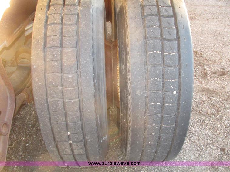 image for item G9811 1990 Cornhusker aluminum triple axle pup dump trailer