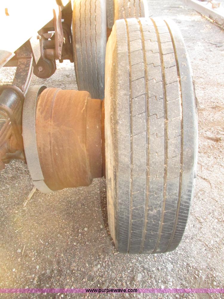 image for item G9811 1990 Cornhusker aluminum triple axle pup dump trailer