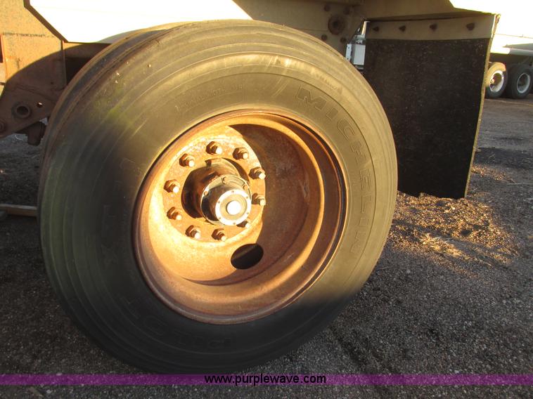 image for item G9811 1990 Cornhusker aluminum triple axle pup dump trailer