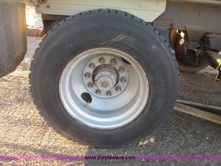 image for item G9811 1990 Cornhusker aluminum triple axle pup dump trailer