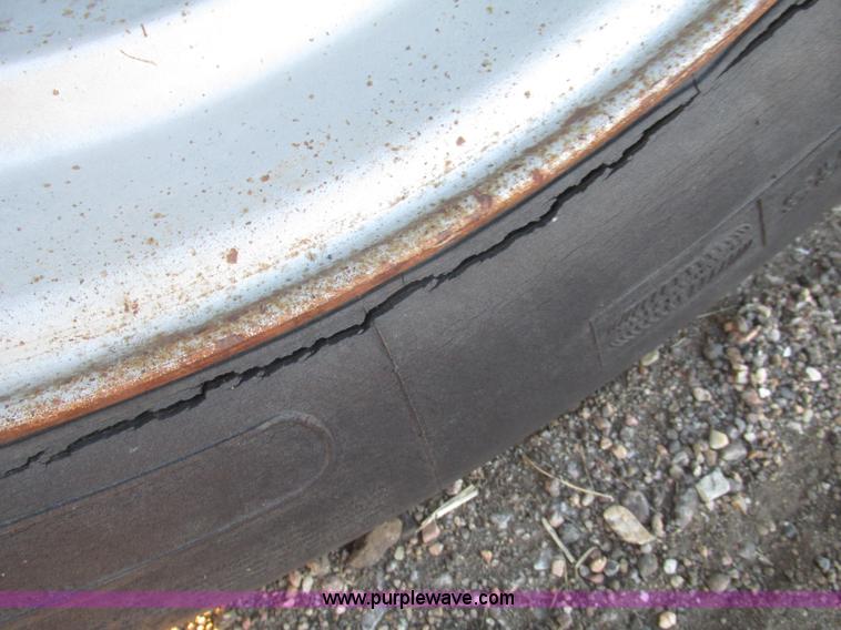 image for item G9811 1990 Cornhusker aluminum triple axle pup dump trailer