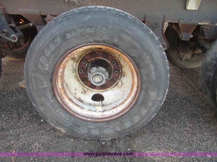 image for item G9811 1990 Cornhusker aluminum triple axle pup dump trailer