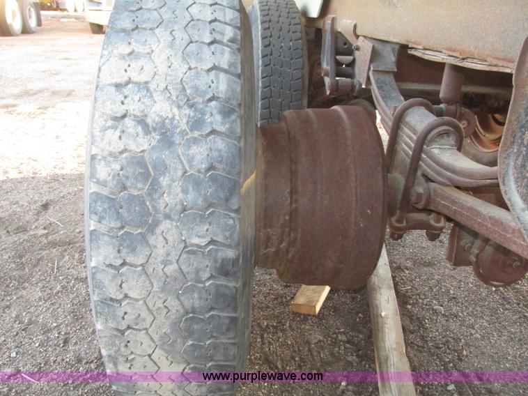 image for item G9811 1990 Cornhusker aluminum triple axle pup dump trailer