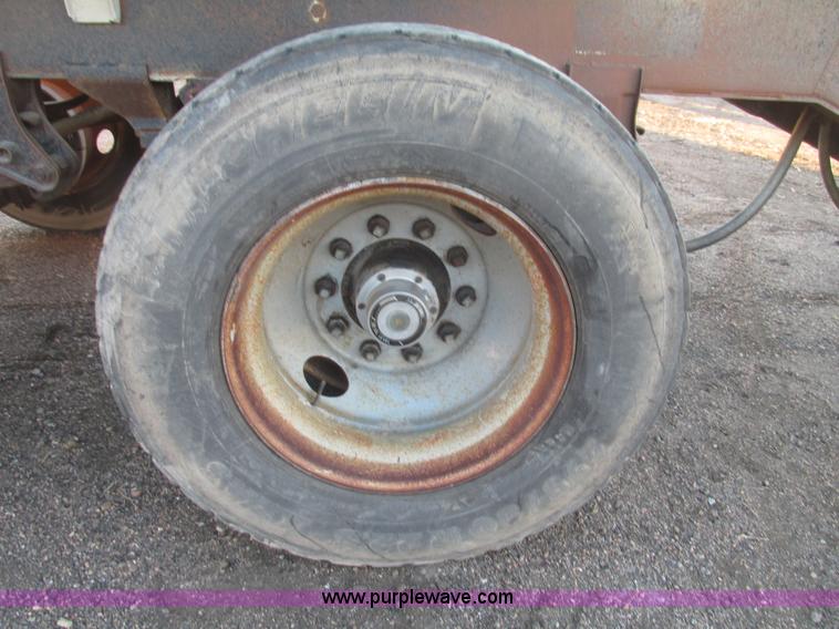 image for item G9811 1990 Cornhusker aluminum triple axle pup dump trailer