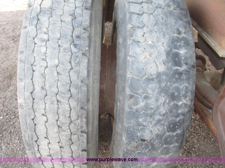 image for item G9811 1990 Cornhusker aluminum triple axle pup dump trailer