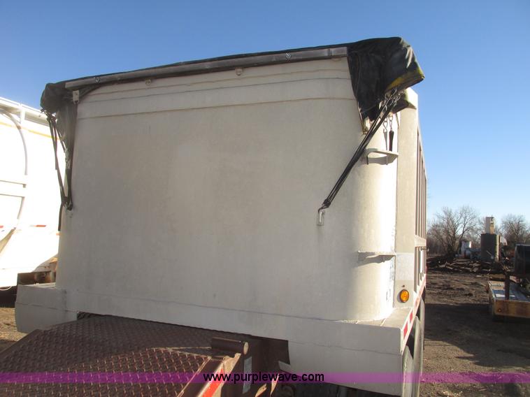 image for item G9818 1987 Ravens triple axle pup dump trailer