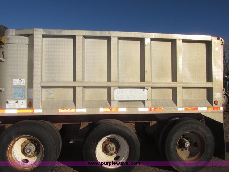 image for item G9818 1987 Ravens triple axle pup dump trailer