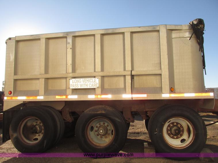 image for item G9818 1987 Ravens triple axle pup dump trailer