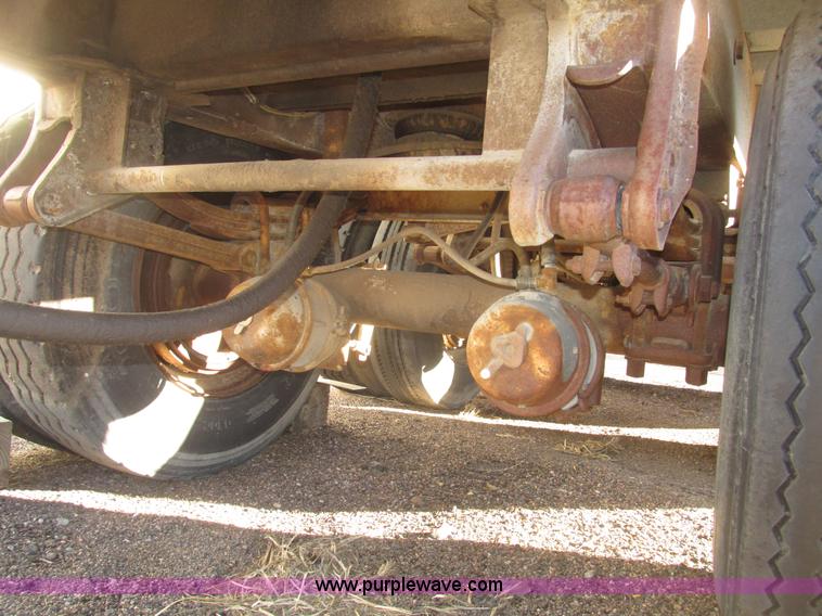 image for item G9818 1987 Ravens triple axle pup dump trailer