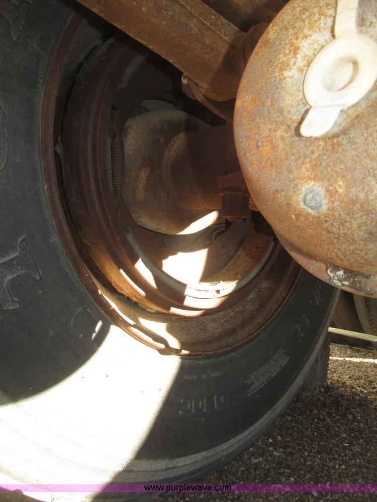 image for item G9818 1987 Ravens triple axle pup dump trailer