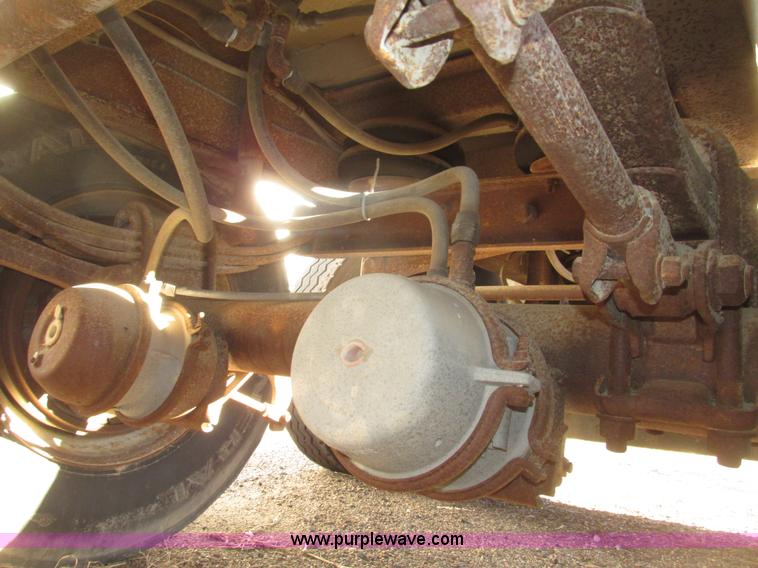 image for item G9818 1987 Ravens triple axle pup dump trailer