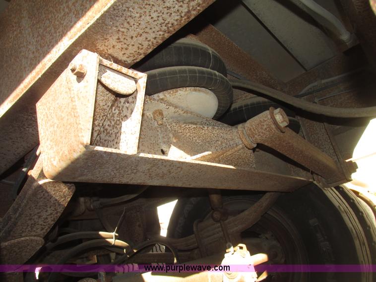 image for item G9818 1987 Ravens triple axle pup dump trailer