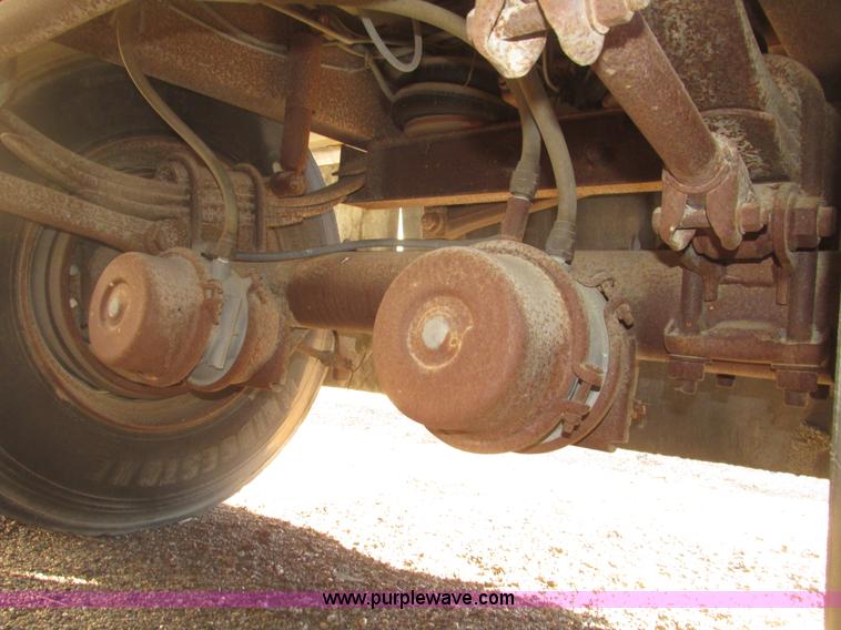 image for item G9818 1987 Ravens triple axle pup dump trailer