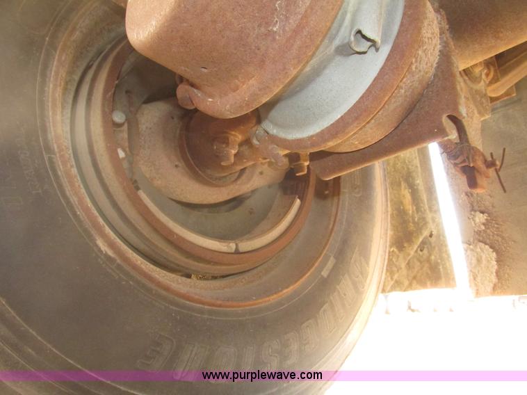 image for item G9818 1987 Ravens triple axle pup dump trailer