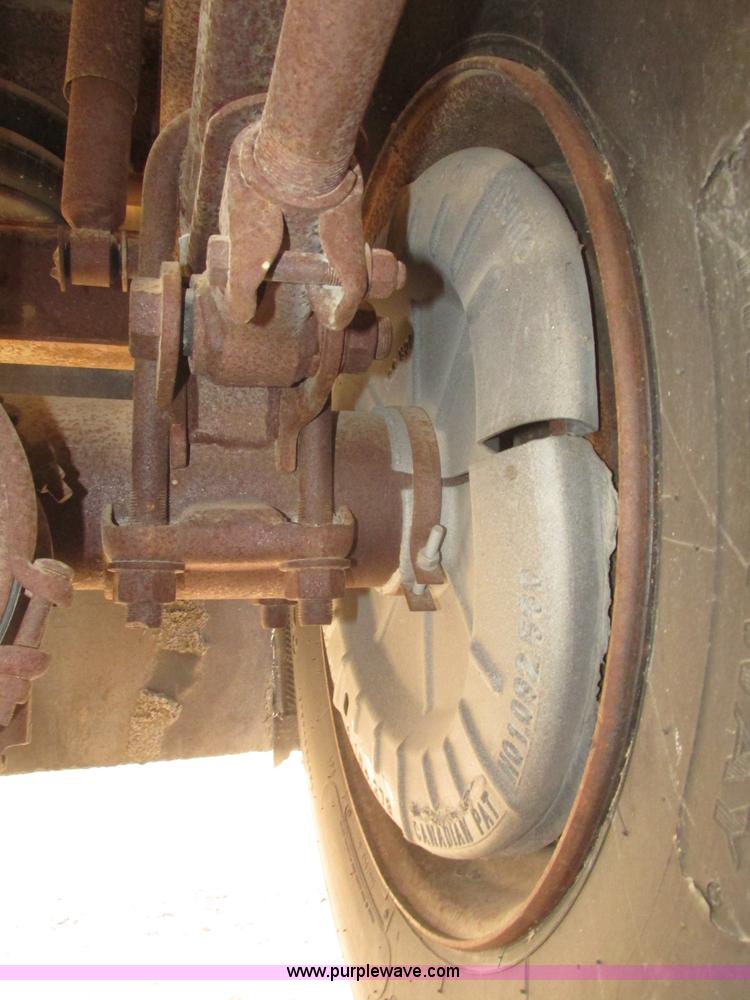 image for item G9818 1987 Ravens triple axle pup dump trailer