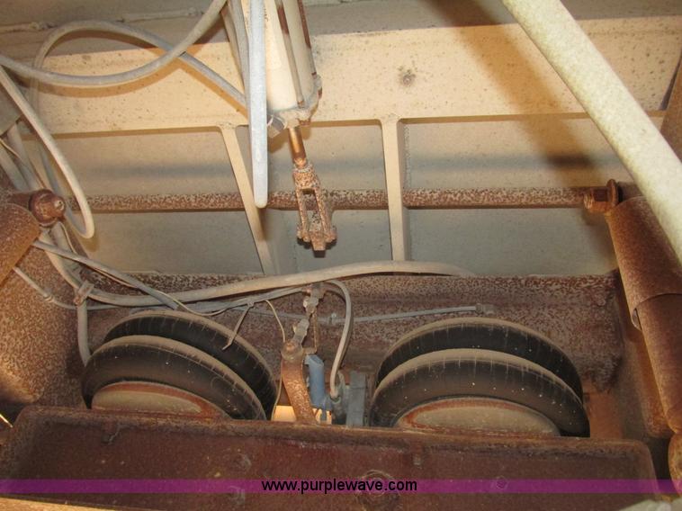 image for item G9818 1987 Ravens triple axle pup dump trailer