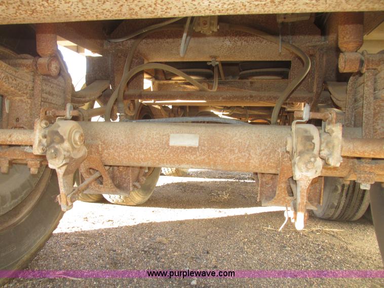 image for item G9818 1987 Ravens triple axle pup dump trailer