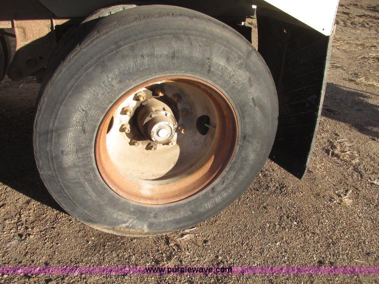 image for item G9818 1987 Ravens triple axle pup dump trailer