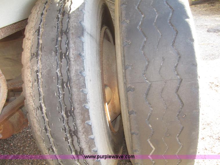 image for item G9818 1987 Ravens triple axle pup dump trailer