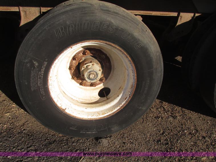 image for item G9818 1987 Ravens triple axle pup dump trailer