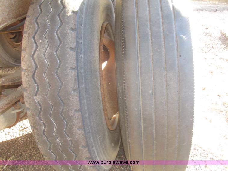 image for item G9818 1987 Ravens triple axle pup dump trailer