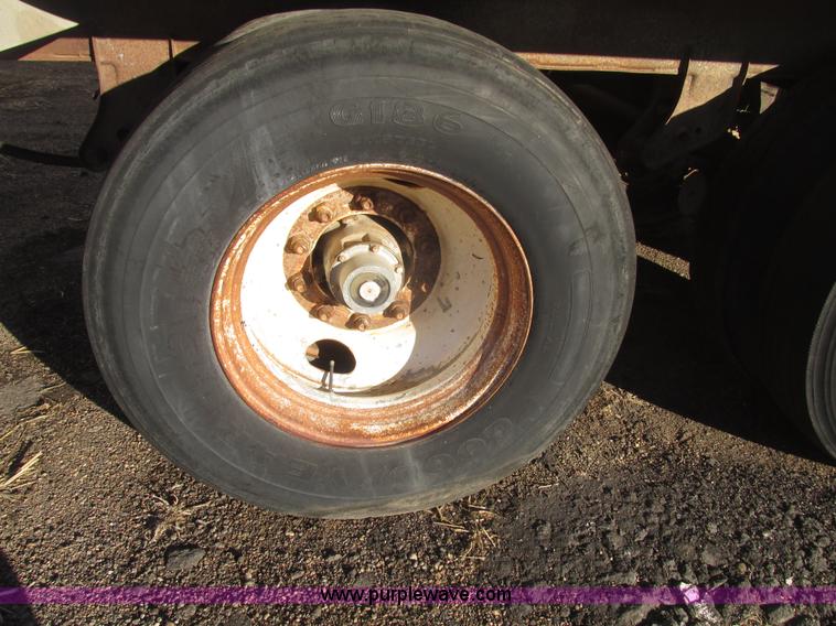 image for item G9818 1987 Ravens triple axle pup dump trailer