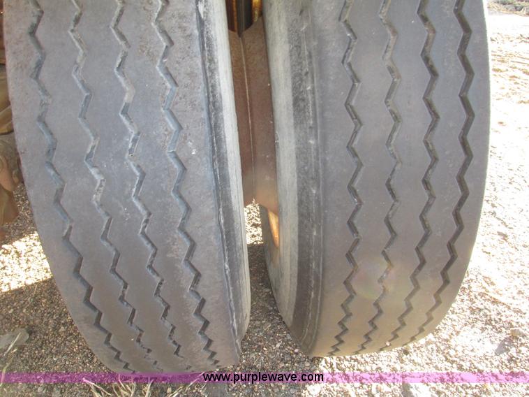 image for item G9818 1987 Ravens triple axle pup dump trailer