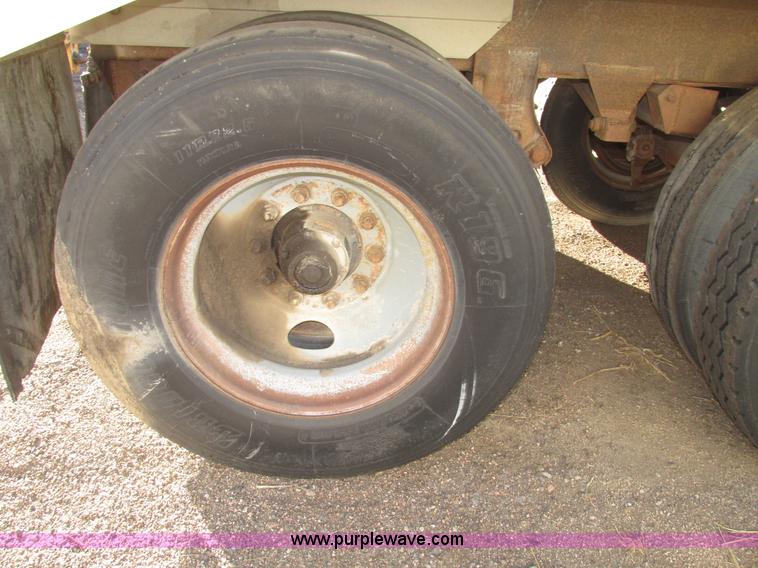 image for item G9818 1987 Ravens triple axle pup dump trailer