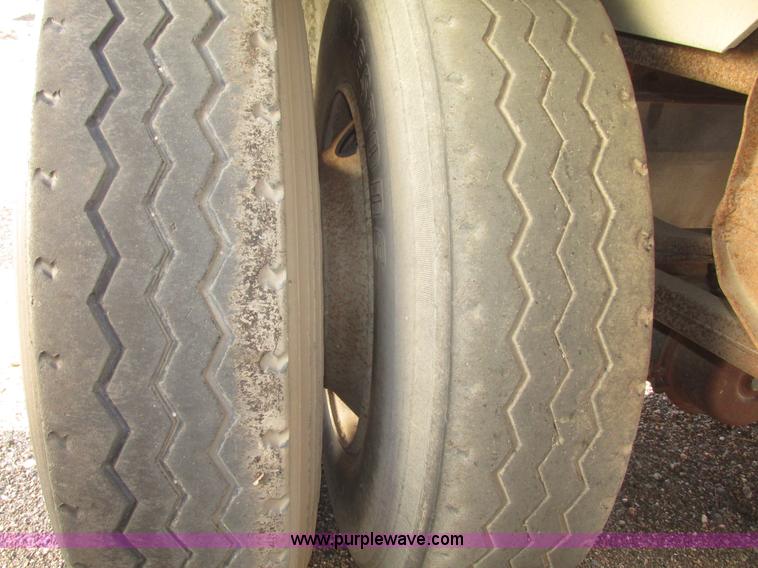 image for item G9818 1987 Ravens triple axle pup dump trailer