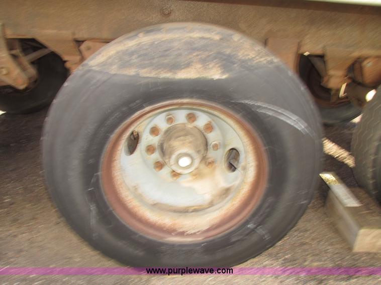 image for item G9818 1987 Ravens triple axle pup dump trailer