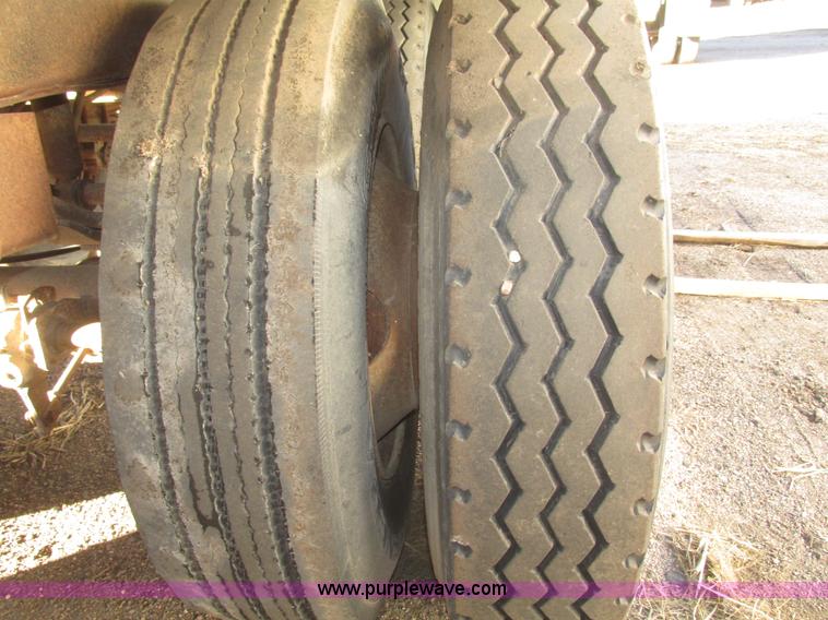 image for item G9818 1987 Ravens triple axle pup dump trailer