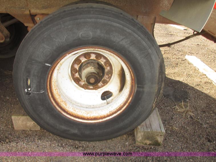 image for item G9818 1987 Ravens triple axle pup dump trailer