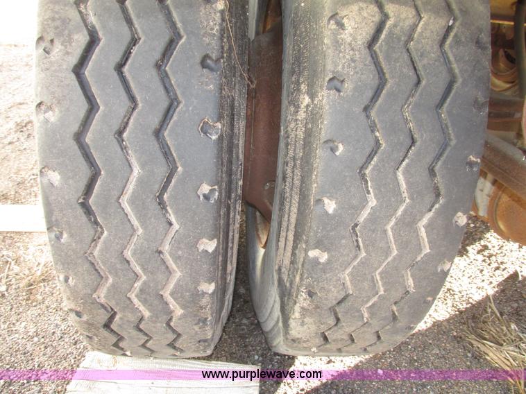 image for item G9818 1987 Ravens triple axle pup dump trailer