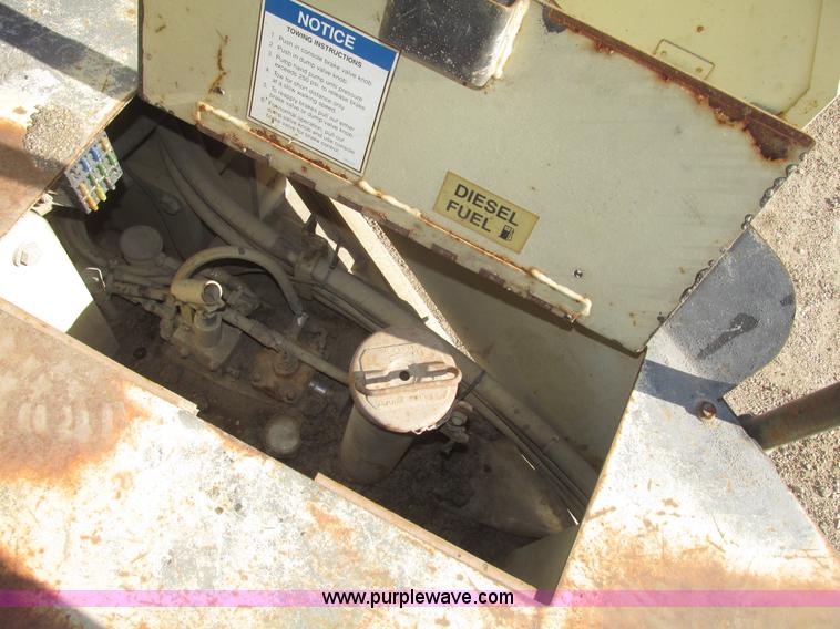 image for item G9836 1994 Ingersoll Rand DD110 articulated smooth double drum vibratory roller