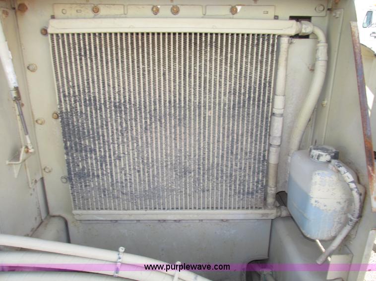 image for item G9836 1994 Ingersoll Rand DD110 articulated smooth double drum vibratory roller