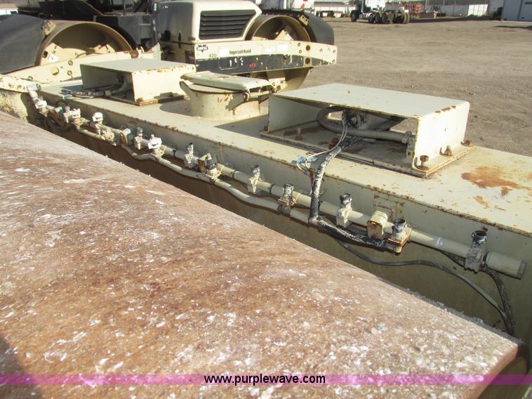image for item G9836 1994 Ingersoll Rand DD110 articulated smooth double drum vibratory roller