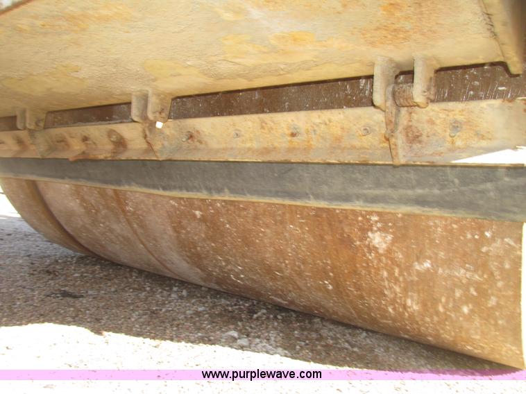 image for item G9836 1994 Ingersoll Rand DD110 articulated smooth double drum vibratory roller