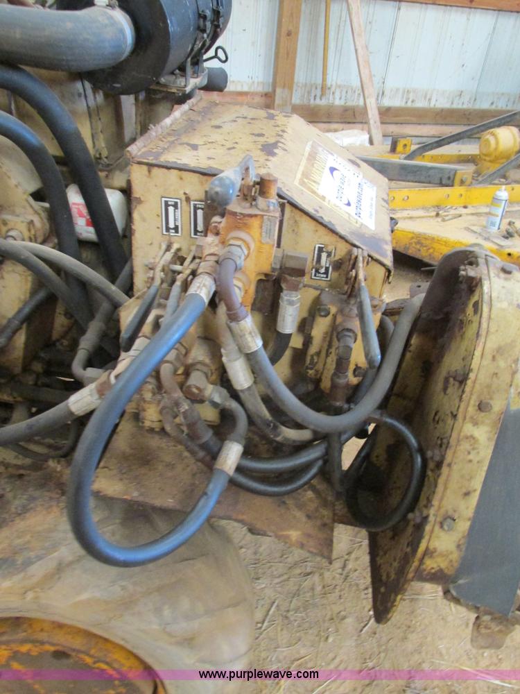 image for item H7579 Burkeen DP30 walk-behind vibratory trencher