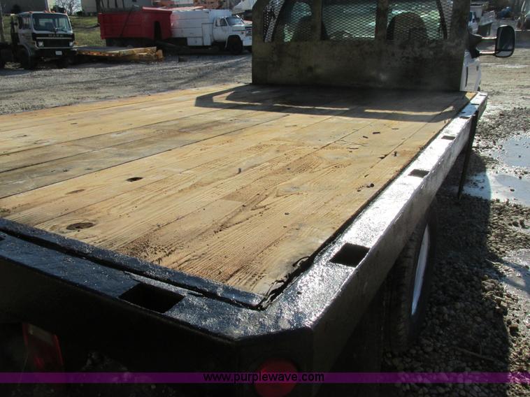 image for item H7613 1999 Ford F350 Super Duty XL flatbed pickup truck