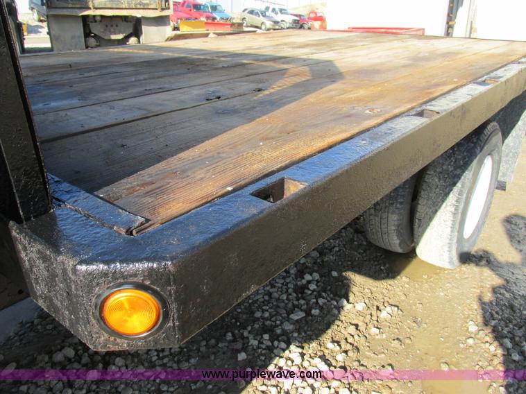 image for item H7613 1999 Ford F350 Super Duty XL flatbed pickup truck