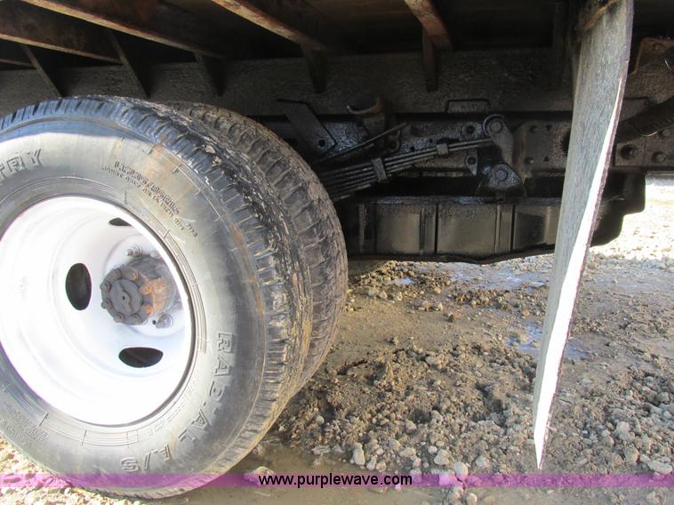 image for item H7613 1999 Ford F350 Super Duty XL flatbed pickup truck